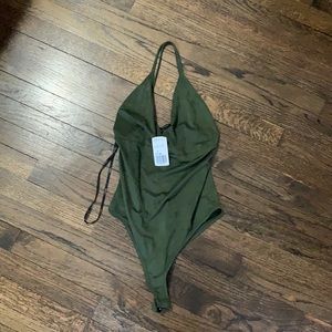 Brand new! Tags on! Suede bodysuit